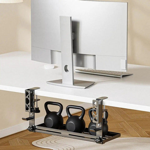 Chill Out The Cord Mess With This Heavy Duty Under Desk Cable Organizer That No Drill Clamps secure on any desk edge, holding kettlebells.