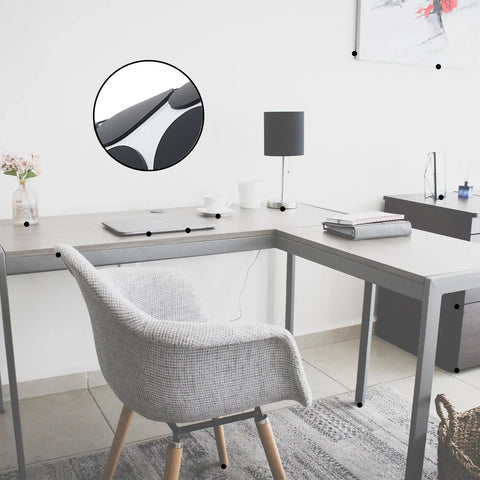Heavy Duty Silicone Furniture Pads 132 Pack Non Slip Rubber Leg Protectors with Tack under chair legs on a modern desk.