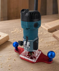 Heavy Duty Trimming Machine Bottom Plate For Woodcraft with blue handle, clear design, and central opening for precise cuts.