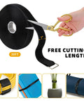 1 Inch By 39 Foot Nylon Hook And Loop Straps Roll With 60 Buckles 30 Metal And 30 Plastic Adjustable Reusable Cut To Length Ties For Home Office Garage Organization Black, shown being cut with scissors