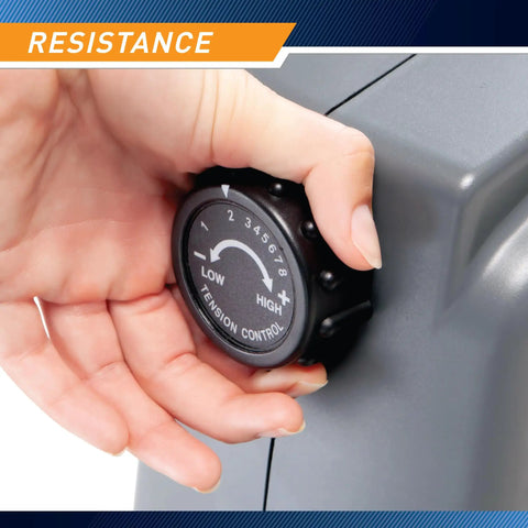 Hand adjusting resistance on Magnetic Recumbent Exercise Bike For Home Gym With Digital Monitor Quick Adjustable Seat Cushioned Backrest Low Impact Cardio That Lets You Ride Smooth And Easy Quiet Workout Machine NS1206R.