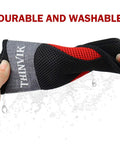 Bike Frame Sweat Guard With Dual Layer Sweat Absorbing Net being wrung out, showing water drainage, highlighting durability and washability.