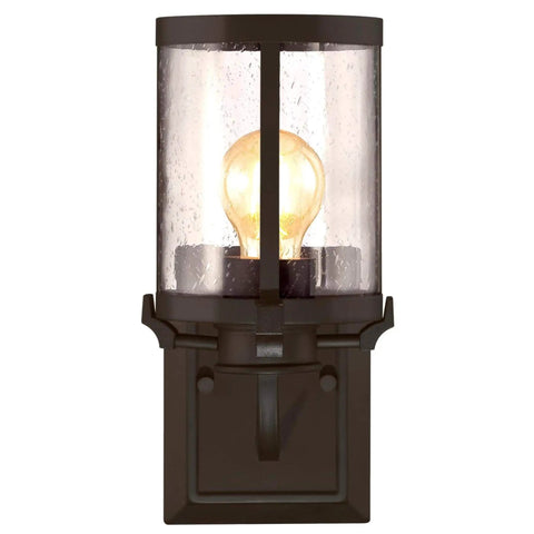 Colville Three-Light Indoor Vanity Wall Fixture In Oil Rubbed Bronze With Clear Seeded Glass, front view, bulb glowing inside glass