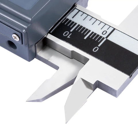Close-up of Pro Grade Digital Caliper 6 Inch 150mm with 4 in 1 Measuring Functions, showing the carbide tipped faces and scale.