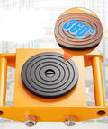 Heavy Duty Machinery Mover Skate Dolly With Four Silent Rolling PU Wheels Delivers A Rock Solid Twelve Ton Capacity For Smooth Warehouse Relocations And Factory Floor Moves That Make Hauling Loads Zero Stress And Absolutely No Sweat, showing the top view with rotating black wheel.
