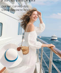 Woman on cruise with Magnetic Hat Clip For Travel On Bag Made From Genuine Leather With Strong N52 Magnet Keeps Your Hat Secure