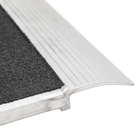 Close-up of the Heavy Duty Aluminum Shipping Container Forklift Ramp 60 By 63 Inch Deck with grip-coated surface.