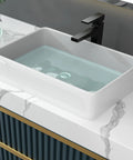Rectangular Vessel Sink 24x16 White Ceramic Porcelain Above Counter Vanity Bowl Built To Last Durable No Fuss Easy To Clean Scratch Resistant High Gloss Finish For Modern Bathrooms on marble countertop with modern faucet