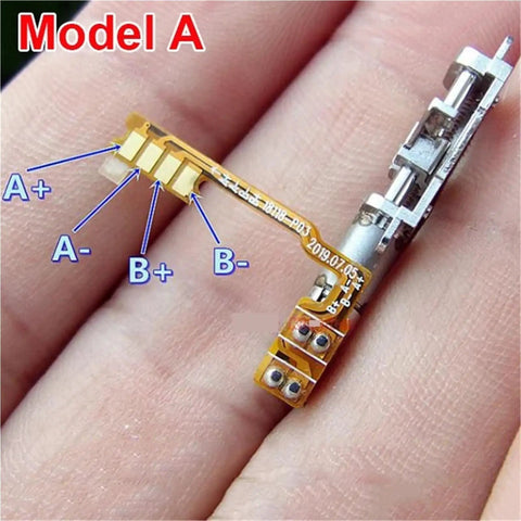Compact Two Phase Four Wire Mini Linear Actuator With Planetary Gearbox Ball Bearing Screw 8Mm 12Mm Stroke Stepper Motor Kit shown on finger.