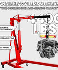 Rock Solid Engine Hoist And Folding Hydraulic Crane Featuring Six Low Friction Casters Built In Leveler Tilt Control And Heavy Duty Steel Shop Workhorse Handling 2 Ton 4400 Lbs Loads with adjustable boom and hydraulic pump.