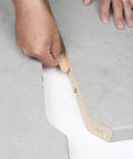 Hand inserting Beechwood Joining Biscuits Variety Pack No 0 10 20 in wood panel for strong joint