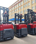 Heavy Duty Manual Pallet Stacker With Wide Turning Radius For Effortless Warehouse Lifting, three units displayed outdoors.