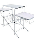 Portable grill table with tons of prep space for camping, tailgating, picnics, and boating. Foldable, collapsible design.