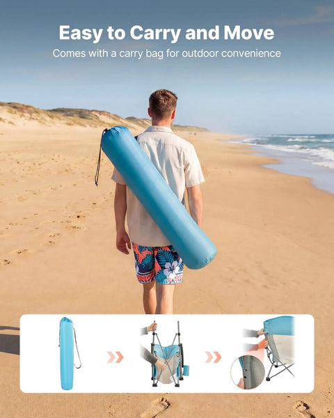 Person carrying Two Pack High Back Folding Beach Chairs For Adults in light blue carry bag on beach
