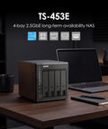 4 Bay Desktop Nas With Intel Quad Core Cpu Boosting To 2.9 Ghz Paired With 8Gb Ram on a desk next to a laptop.