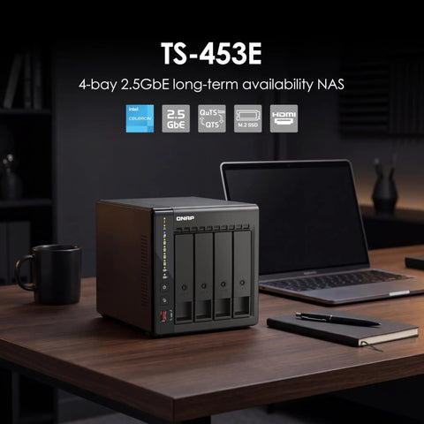4 Bay Desktop Nas With Intel Quad Core Cpu Boosting To 2.9 Ghz Paired With 8Gb Ram on a desk next to a laptop.
