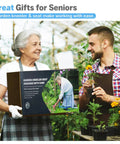 Two people in a garden holding Heavy Duty Garden Kneeler And Seat 2In1 Foldable Stool box with plants in the background.