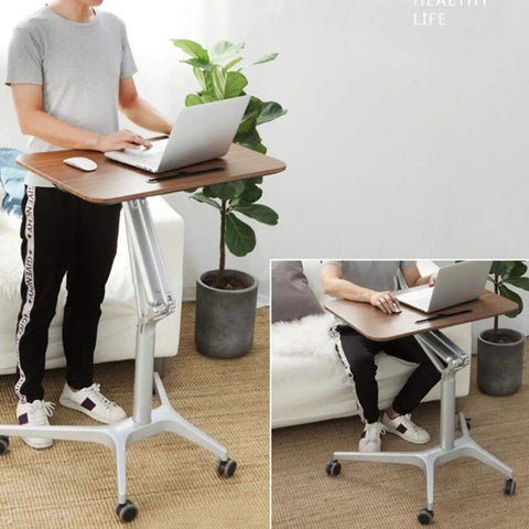 Rolling Laptop Desk With Adjustable Height Stand Ergonomic Portable Workstation For Home Office Gaming Setup, person using mobile desk.