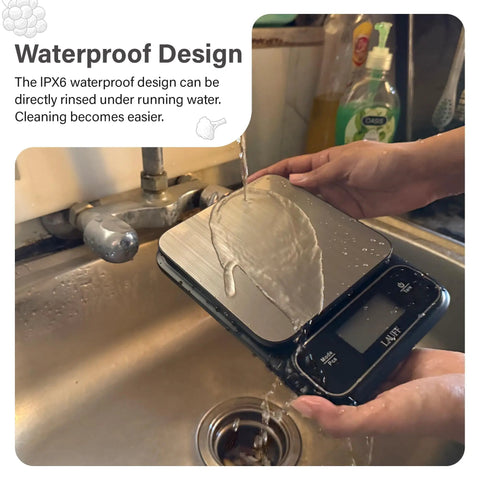Digital Kitchen Scale For The Home Chef, Your Go-To Precision Tool For Baking And Meal Prep, Waterproof And Easy To Clean, Converts Grams Ounces Milliliters Pounds And Carats, 0.01 Oz, 1 G Accuracy, Clear LCD Display, 5 Kg Capacity displayed being rinsed under running water in a sink.