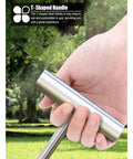 Hand gripping a T-shaped steel handle of the Beefy Steel Manhole Cover Hook With Smart Leverage For Hassle Free Septic Tank Removal