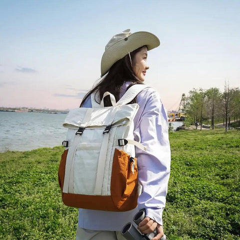 Woman with Go To Lightweight Waterproof Backpack For Everyday Adventure in nature setting