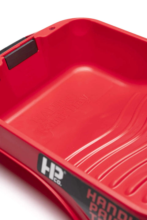 Close-up of Deep Well Paint Tray With Gallon Capacity, Dual Handles, Magnetic Brush Holder showing interior ridges and handle details.