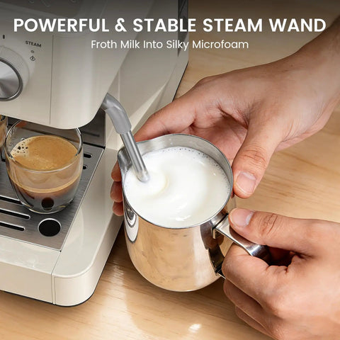 Top Shelf Espresso Machine With Built In Burr Grinder And 20 Bar Pump for killer coffee shots; hand frothing milk with steam wand.