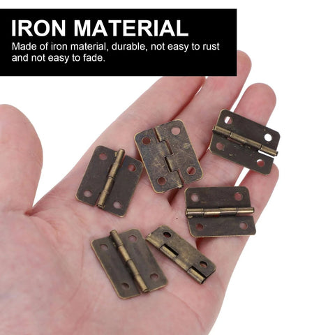 Hand holding 2 Inch Mini Folding Hinges With Screws In Antique Copper, 20 Pack For Jewelry Boxes, Wooden Cases, Small Craft Boxes, And DIY Projects