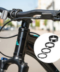 Dope 12 Piece Aluminum Bicycle Headset Spacers Set For Mountain And Road Bikes displayed on a bike stem with spacer sizes shown
