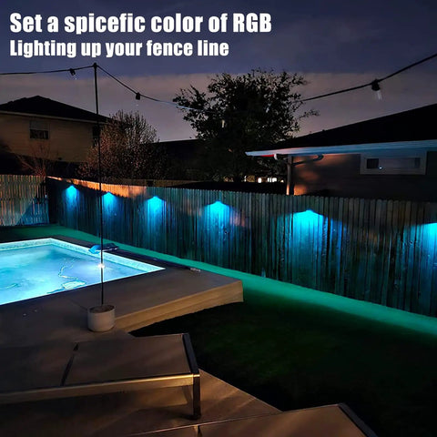Solar Fence Lights 8 Pack IP65 Waterproof Outdoor RGB Color Lights With 10 Colors And 5 Modes on backyard fence at night