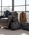 Black leather bags on a chair next to a coat. 12 Piece Black Zip Puller Repair Kit Instant Zipper Set Replacement Pack For Coats Jackets Luggage