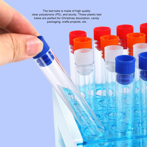 Hand holding one tube from 40 Pack Plastic Test Tubes With Rack And Color Coded Caps 12Ml 16X100Mm Polystyrene Clear Durable Lab Tubes