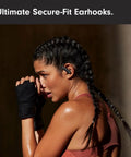 Woman wearing Powerbeats Pro 2 Wireless Noise Canceling Workout Earbuds With Secure Fit Earhooks For Your Gym Grind in Jet Black.