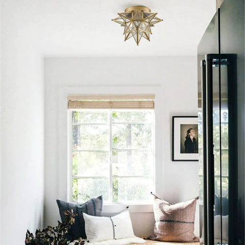 Moravian Star Flush Mount Ceiling Light With Seeded Glass Shade 12.8 Inch Gold Brass Fixture in modern bedroom