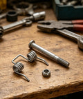 Heavy Duty VOSAREA Folding Wagon Handle Torsion Spring Kit, silver steel coil parts with bolt and nut on workbench