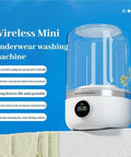 Portable Mini Washing Machine Rechargeable Compact Personal Laundry Sidekick For Underwear And Socks Lightweight Travel Quick Spin Cycle on a blue background.