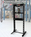 Heavy Duty 20 Ton H Frame Hydraulic Shop Press With Bearing Installation Kit And Adjustable Work Table For U Joint Repair in a workshop.