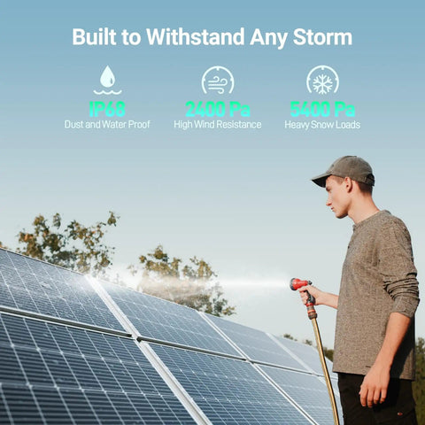 Man rinsing High Efficiency Bifacial 100W 12V Solar Panel With 9BB Monocrystalline Cells for Battery Charging with hose