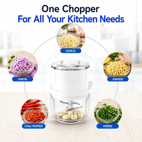 Mini Electric Garlic chopper with 350ml Thick Glass Bowl and Upgraded 6 Stainless Steel Blades on kitchen table.
