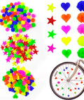 Colorful 315 Piece Bike Wheel Spoke Beads Kit with star, heart, sphere shapes shown in assorted colors, clipped on kid's bicycle wheel.