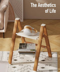 2 Step Stool Foldable Aluminum Ladder, Ultra Lightweight And Space Saving, Compact Portable Step Ladder For Home, Kitchen, Garage, And High Shelves Indoors. Foldable wooden-style frame with two white steps and books on top.