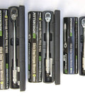 Reversible Click Torque Wrench Set With 1/4 In, 3/8 In, And 1/2 In Drive - Black Finish, tools in cases, top view.