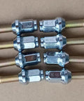 Beefy Wheel Stud And Nut Kit Replacement For Polaris ATV And UTV Front And Rear 8pcs 3/8-24 Threads displayed on table