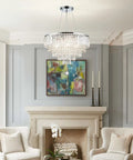 Glam Crystal Chandelier Pendant Light, 19.7 Inch Teardrop Crystal Drops, 6 Lights in modern living room above fireplace.