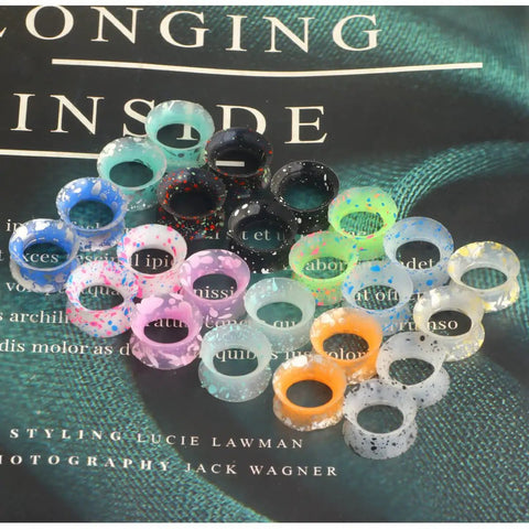 Ultra Thin Silicone Ear Gauges Set 24 Pieces 12 Styles Flexible Flesh Tunnel Expander Kit displayed on a surface