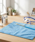 Flame Test Wire Kit With Cobalt Glass Filter Sheet, Metal Alloy Wire And Blue Glass Rods on table with safety goggles and vials