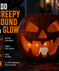 Sound Activated Halloween Fright Box With Three Glowing Led Lights And Scream Module inside a carved pumpkin.