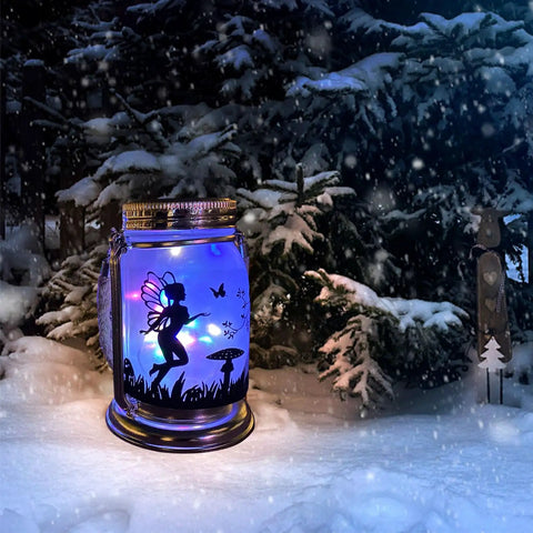 2 Pack Solar Fairy Lanterns For Garden Decor hanging Mason jar with LED lights, fairy silhouette, snowy forest scene