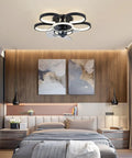 Dope 20 Inch Modern Ceiling Fan With Integrated Led Chandelier Light in sleek black and gold design above a cozy bedroom.