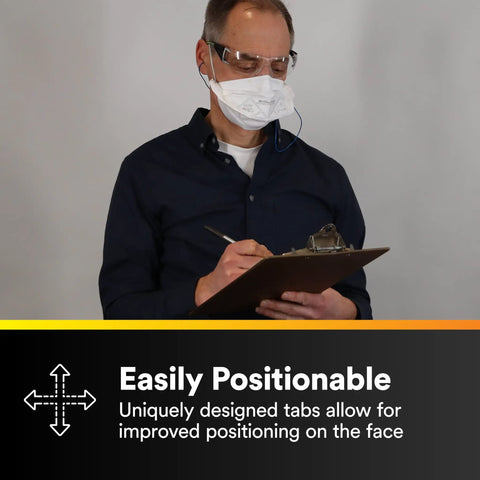 Man wearing N95 Disposable Respirator With VFlex 9105 Particulate Mask taking notes, showing improved face positioning feature.